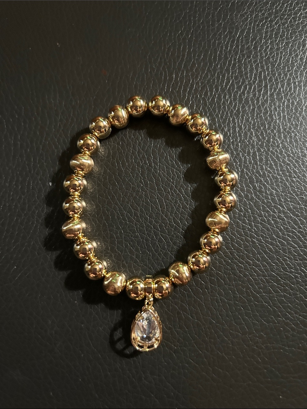 Gold Beaded Stretch Bracelet with Teardrop Crystal Charm
